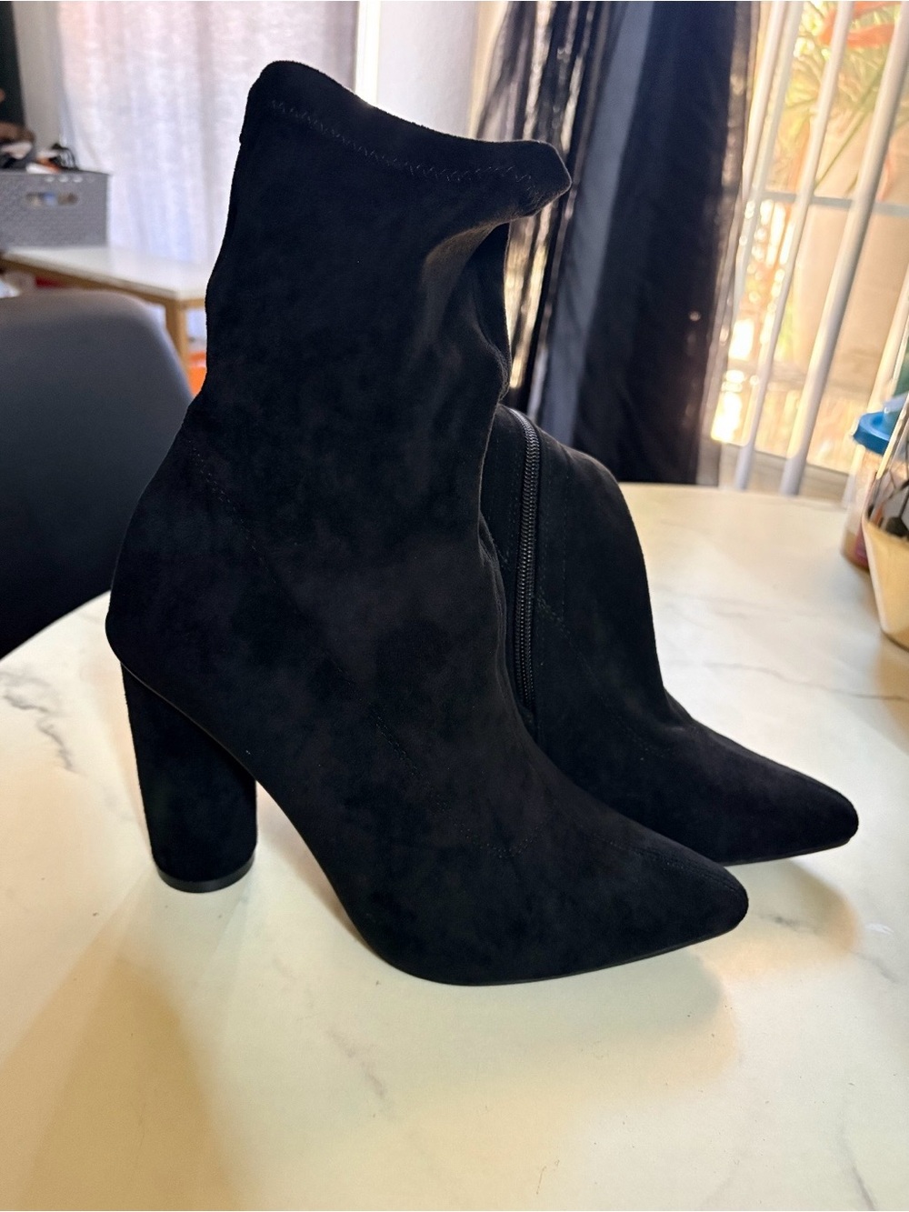 Women’s black suede pointed boots